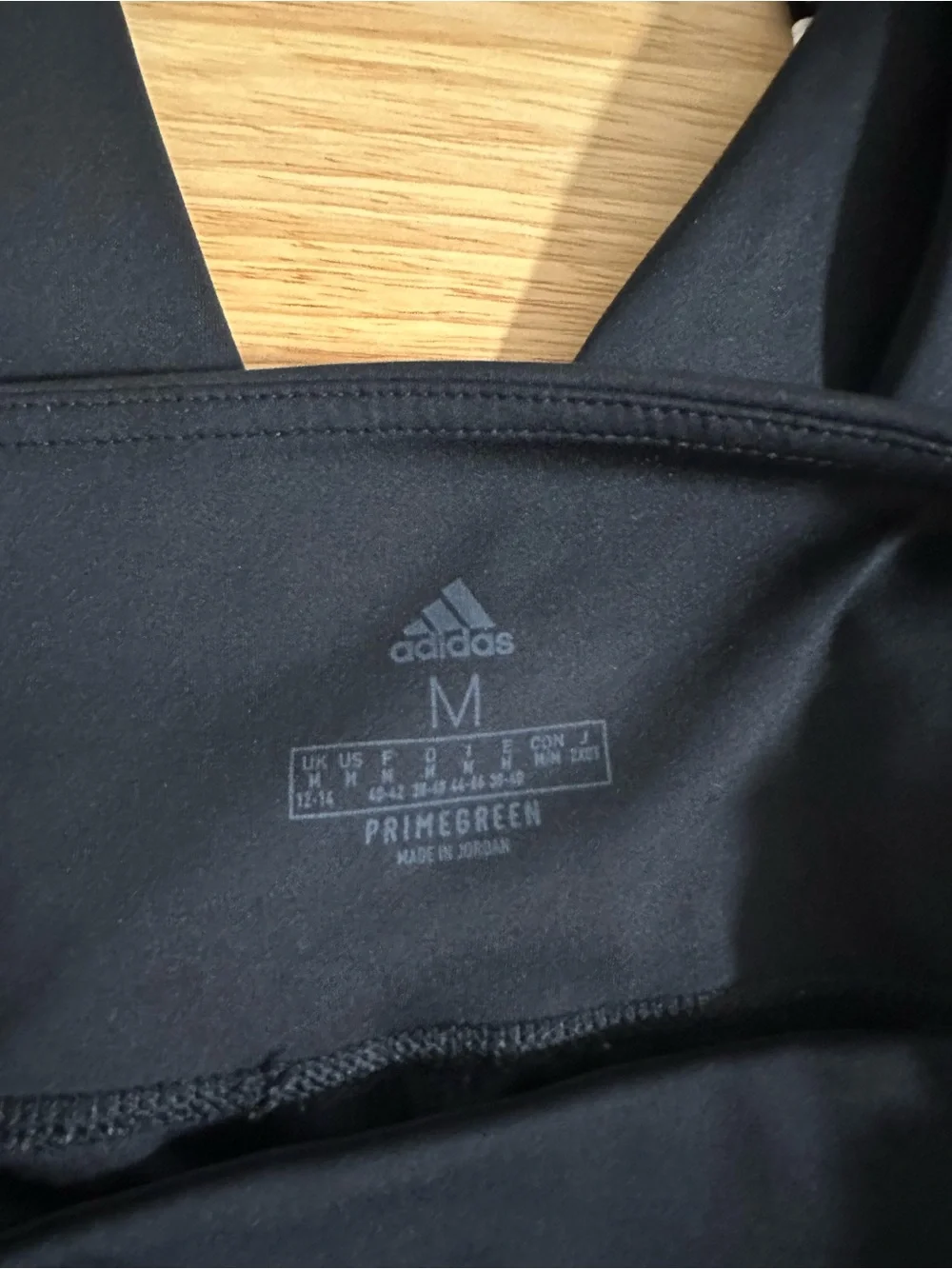 Adidas Black Unisex Athletic Leggings with White Stripes and Pocket